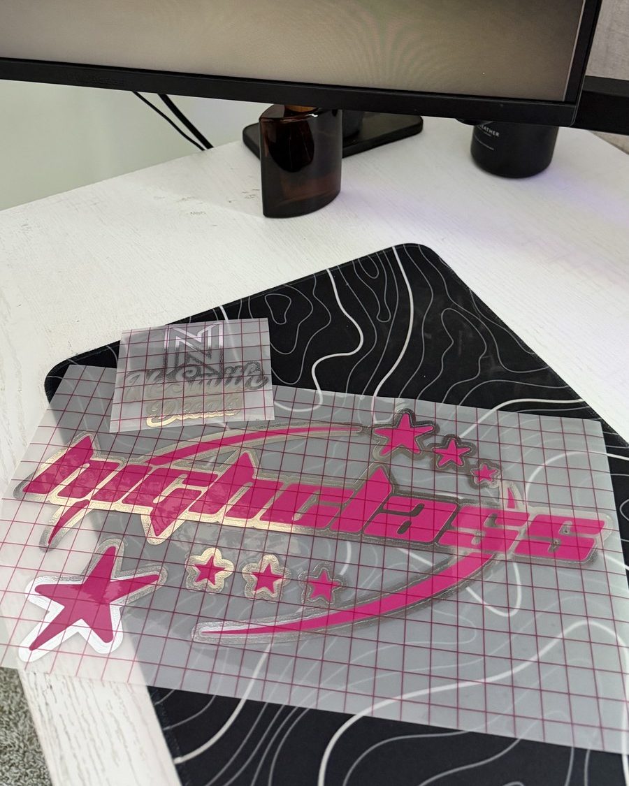 Hot pink and chrome club logo decal with stars, on transfer tape