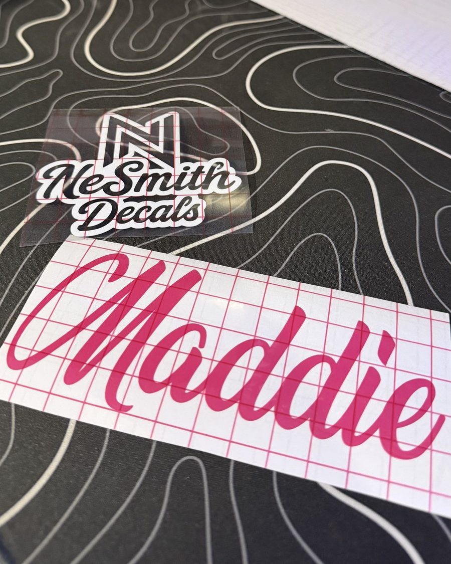 Hot pink script name decal on transfer tape