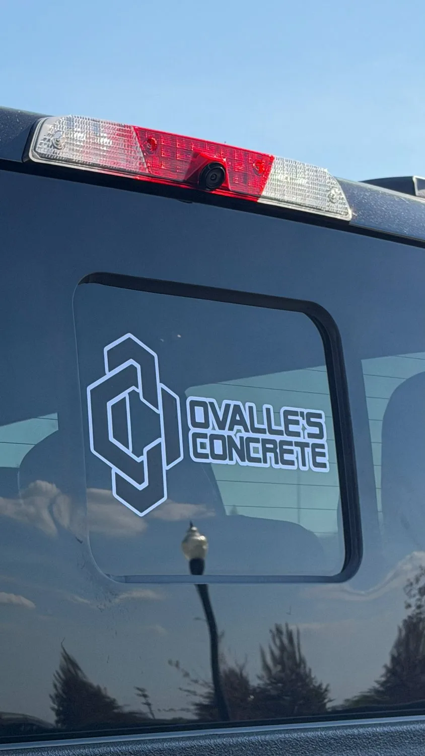Ovalle's Concrete business decal on a truck window